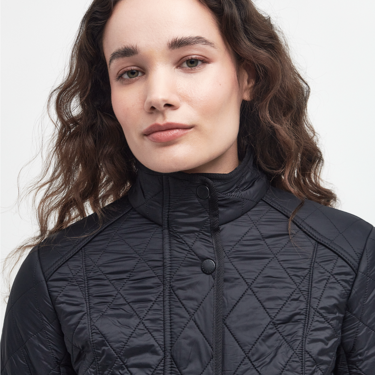 Close up of Barbour Cavalry Polarquilt Black on model