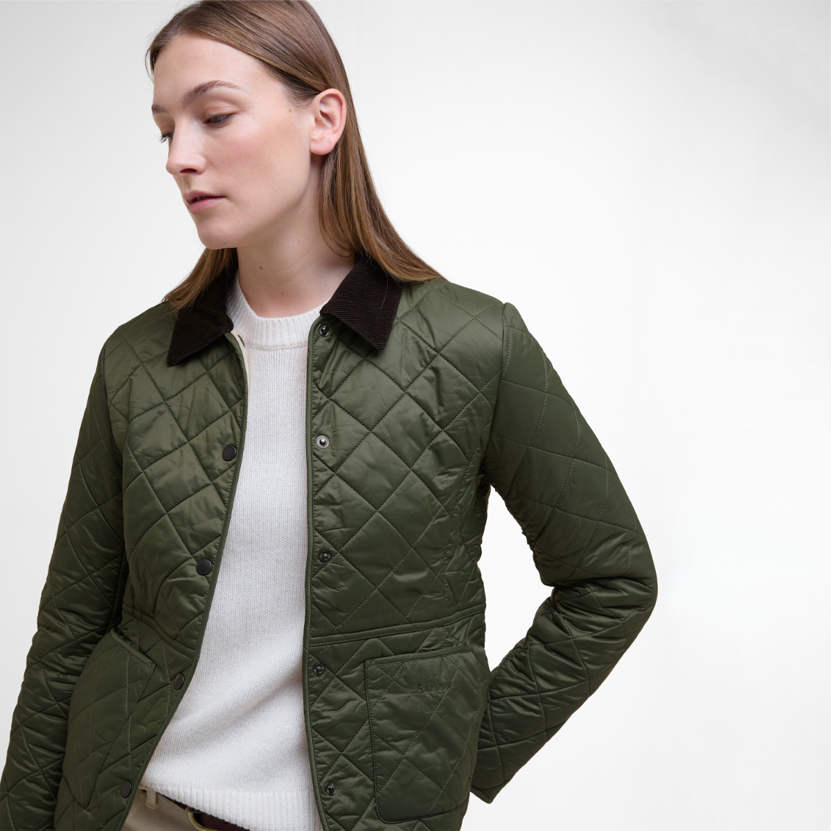 Close up of Deveron Polarquilt Jacket in Olive on model
