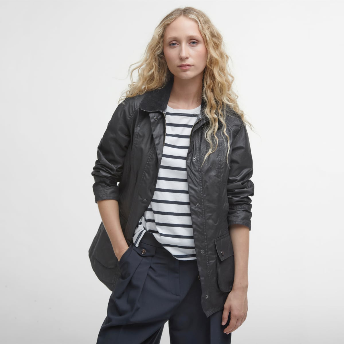 Barbour Beadnell wax jacket in black on model