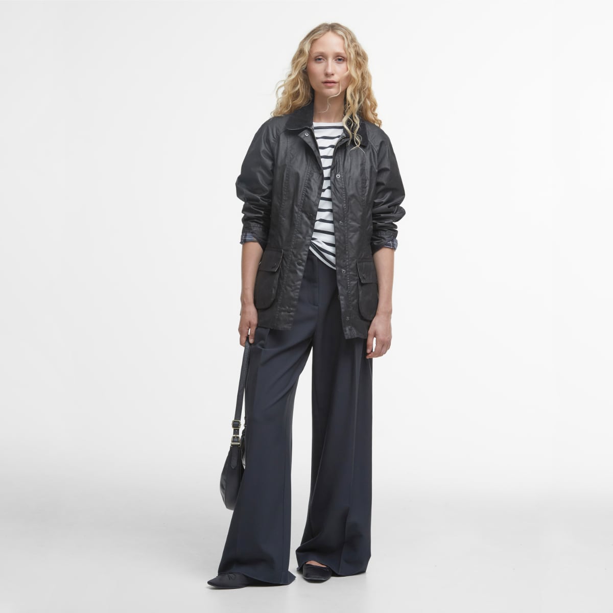 Barbour Beadnell wax jacket in black on model full height