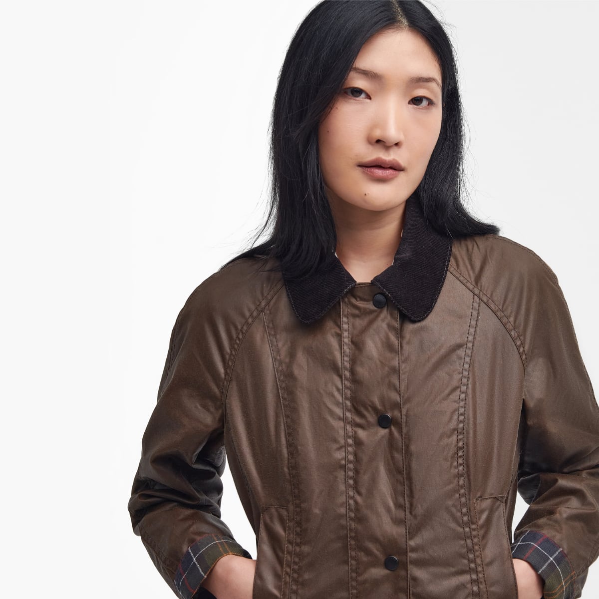Close up of Barbour Beadnell wax jacket in bark on model showing collar