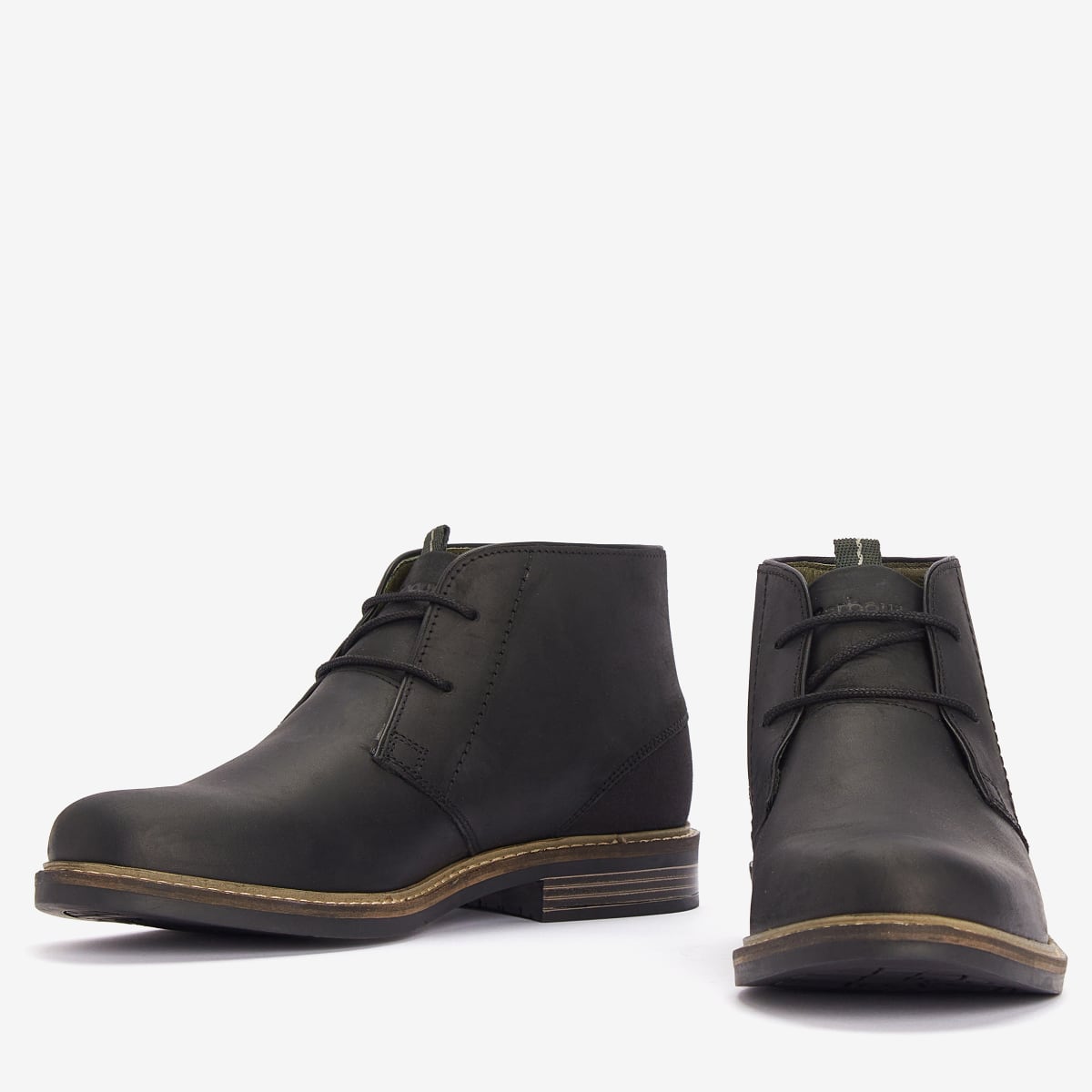 A pair of black Barbour Readhead Men's Chukka Boots displayed against a white background, showing the side and front views.