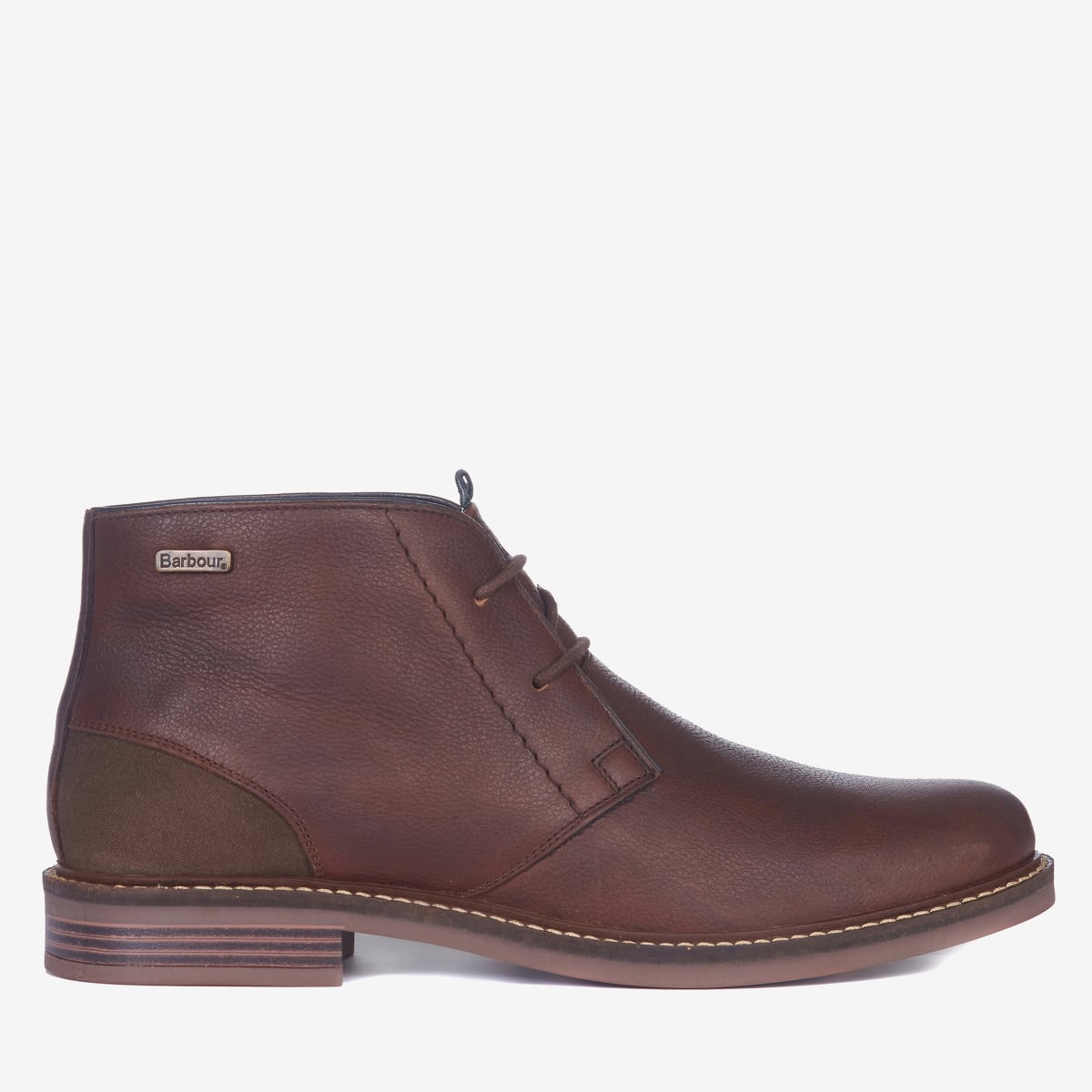 A pair of Barbour Readhead Men's Chukka Boots in teak color, featuring a lace-up closure, with tartan detail on the tongue and a metal Barbour badge.
