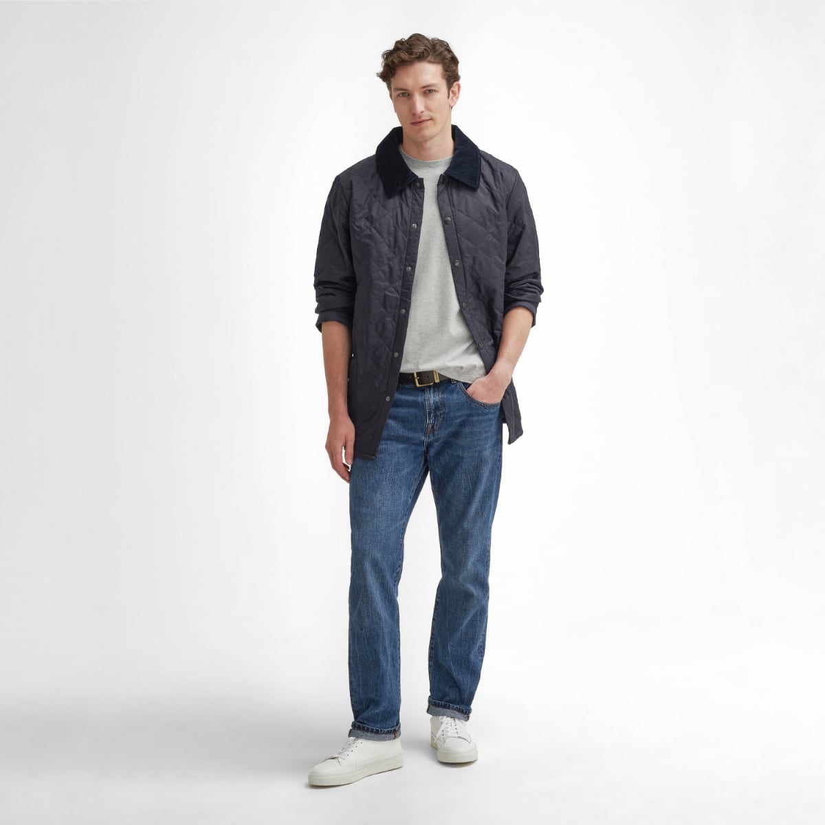 Front view of model wearing a Barbour Liddesdale Quilted Jacket in Navy full height