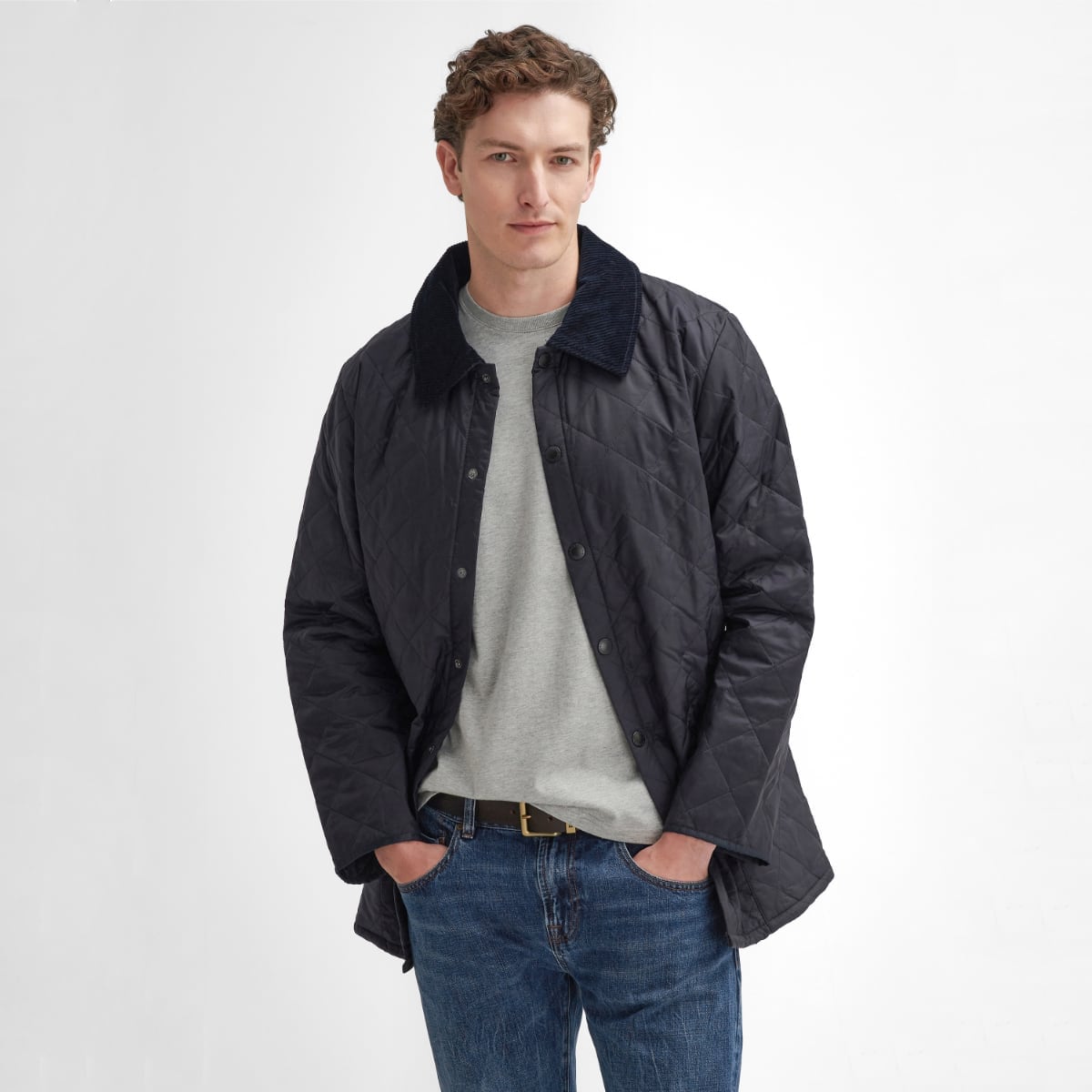 Front view of model wearing a Barbour Liddesdale Quilted Jacket in Navy