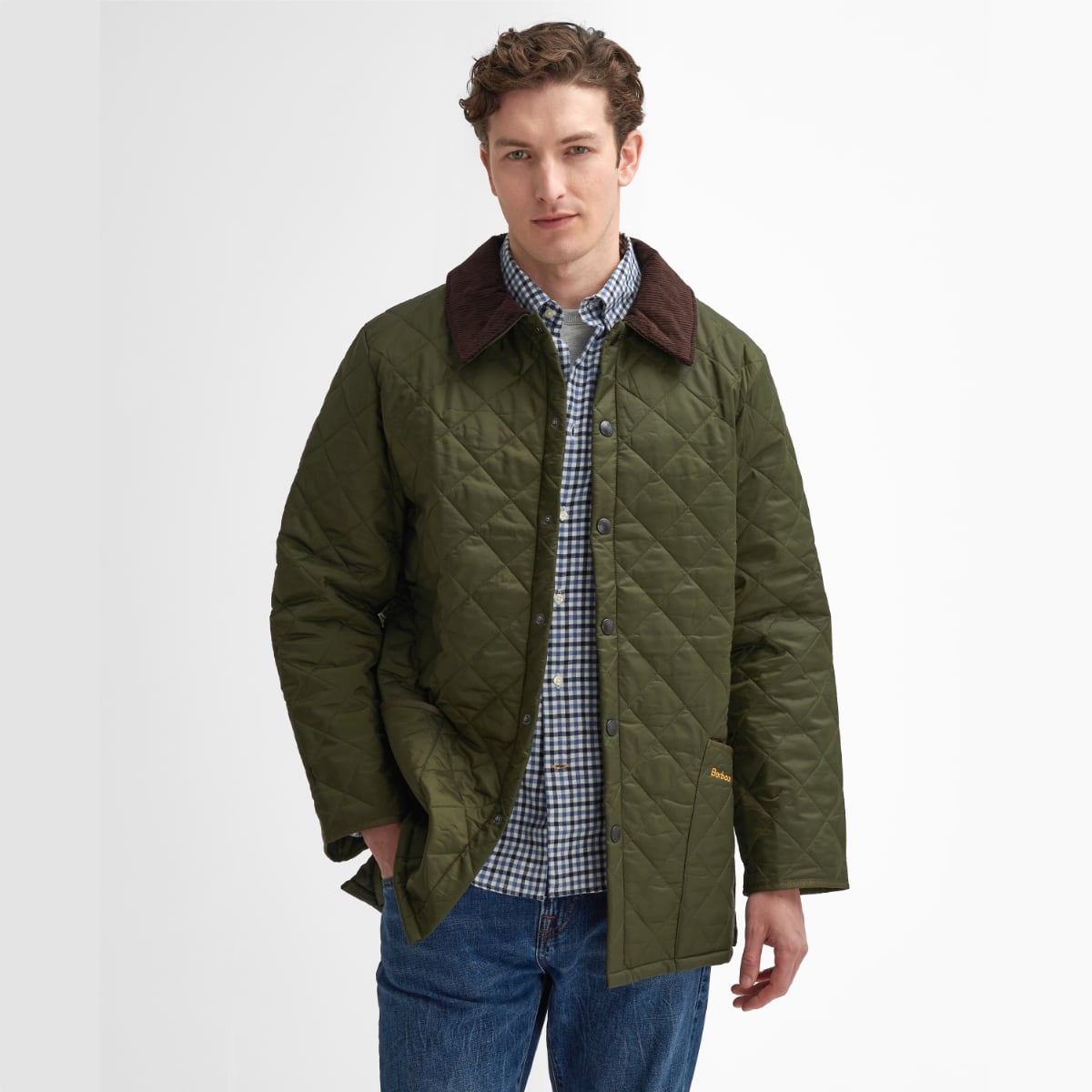Front view of model wearing a Barbour Liddesdale Quilted Jacket in Olive