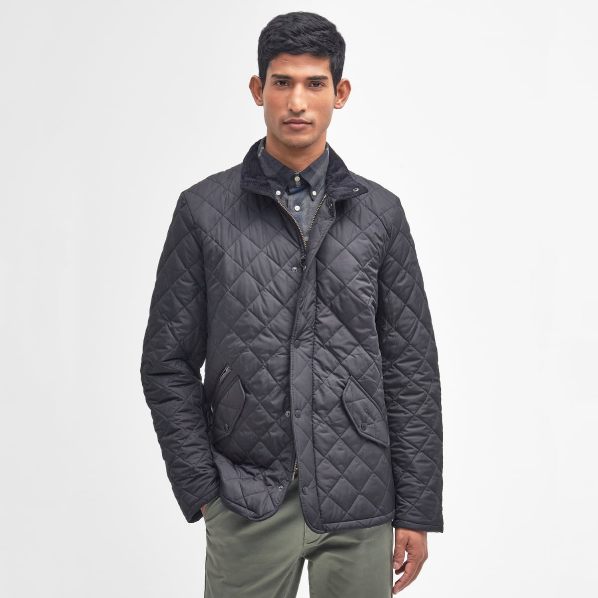 Barbour Chelsea Sportsquilt in Black on model