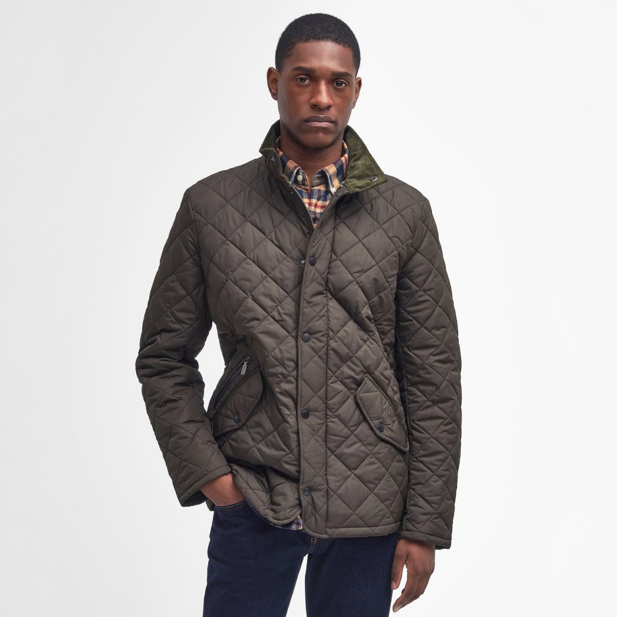 Front view of Barbour Chelsea Sportsquilt in olive on model