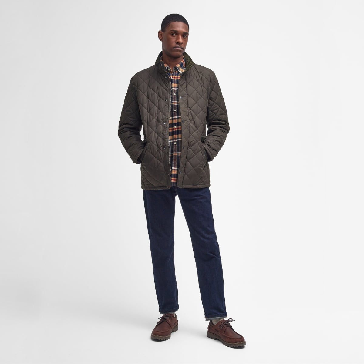 Front view of Barbour Chelsea Sportsquilt in olive on model full height