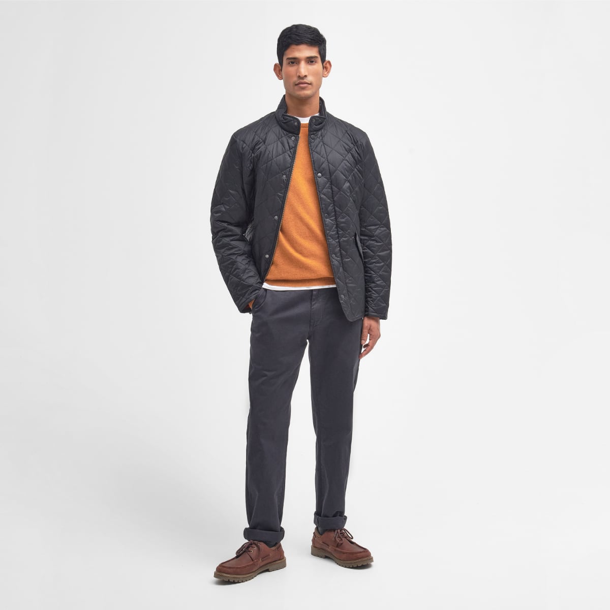 Front view of Barbour Flyweight Chelsea Quilted Jacket in black on model full