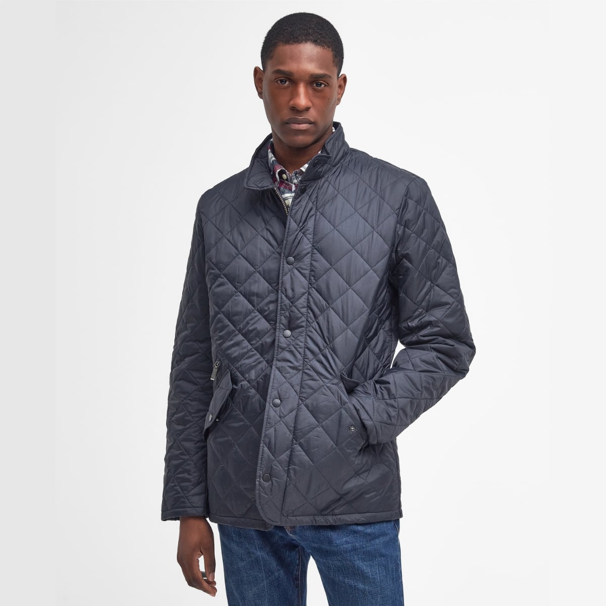 Front view of Barbour Flyweight Chelsea Quilted Jacket in Navy on model