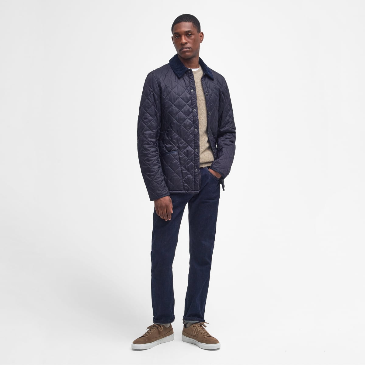 Front view of Barbour Heritage Liddesdale quilted men’s jacket in navy on model full height
