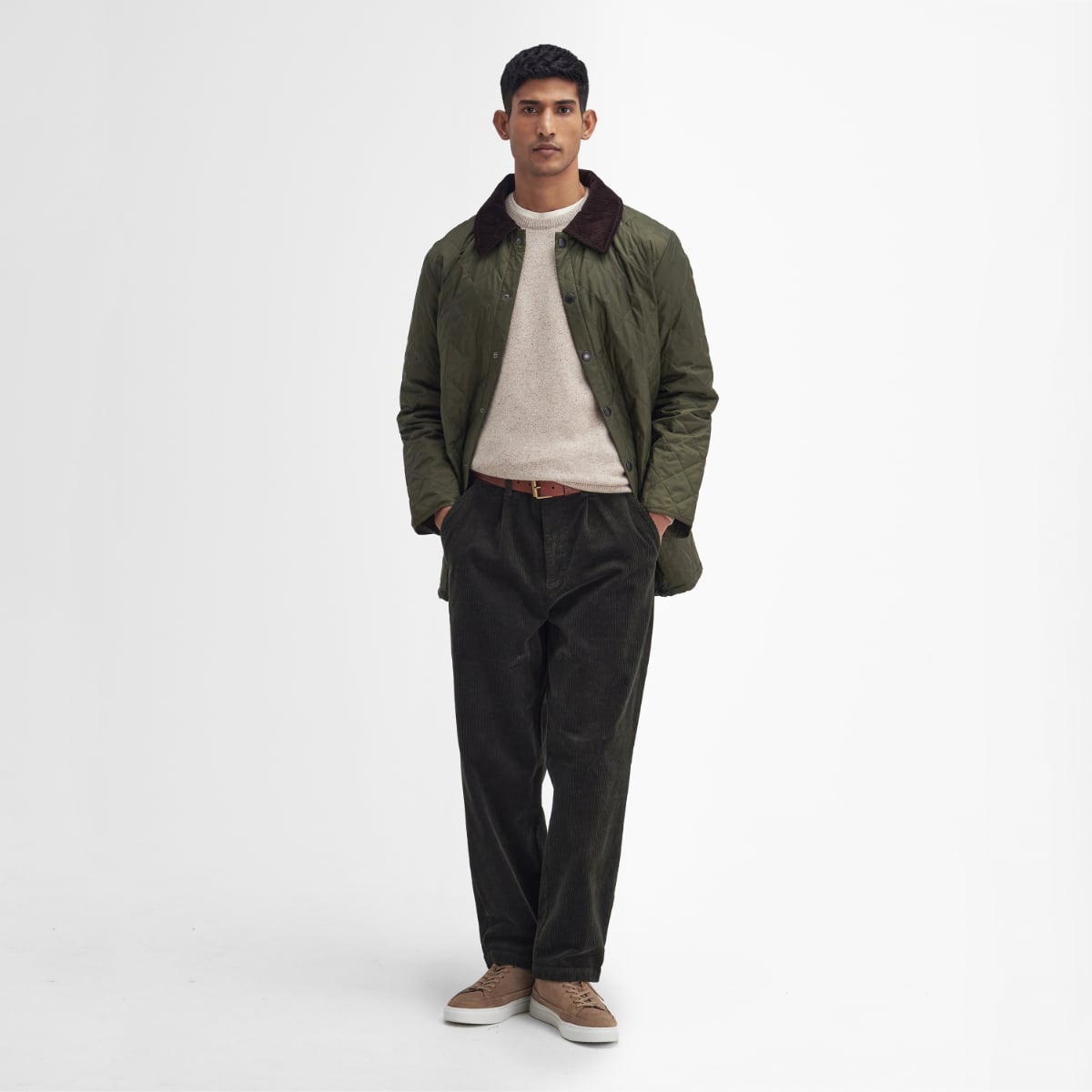 Front view of Barbour Heritage Liddesdale quilted men’s jacket in olive on model full height