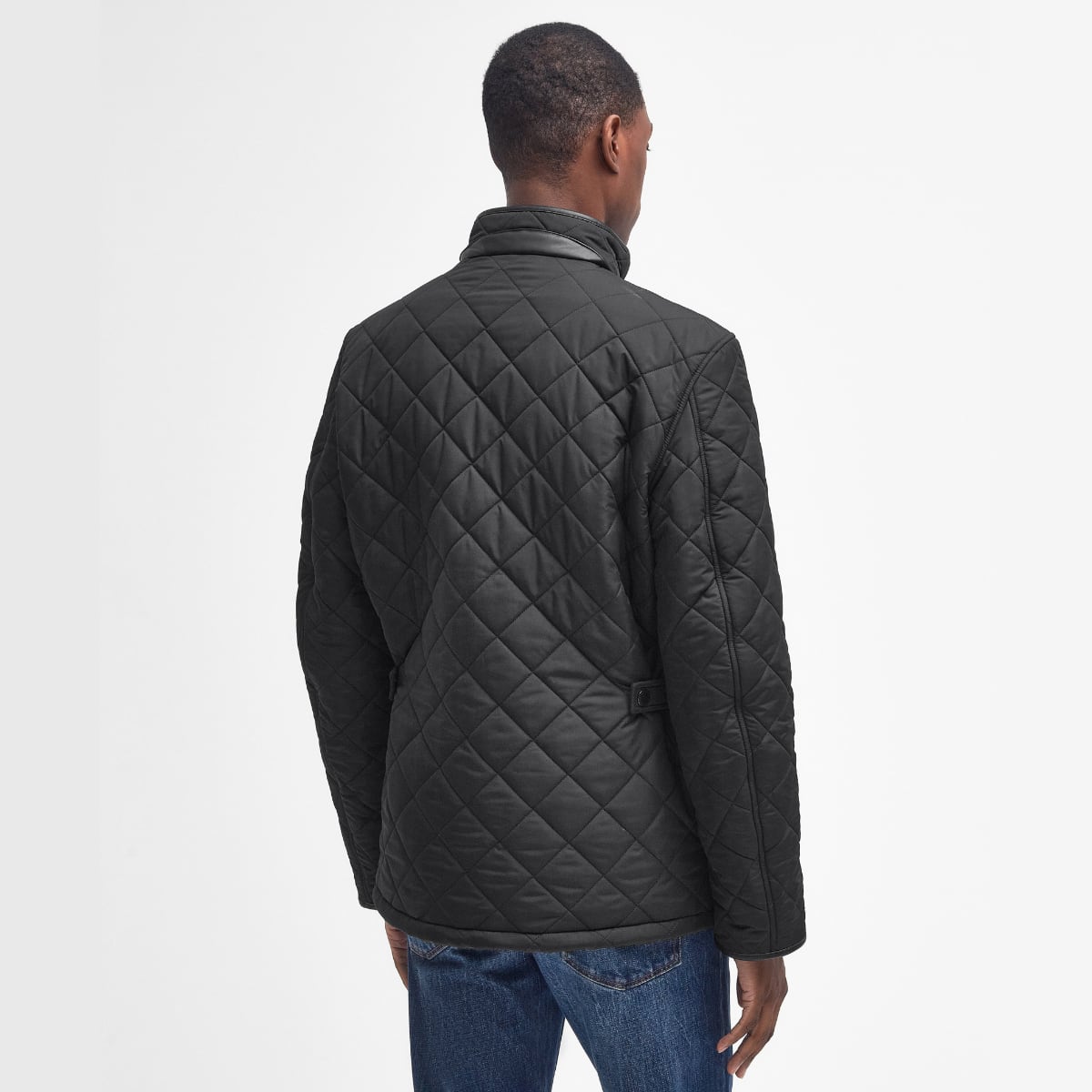 Rear view of Barbour Powell Quilted Jacket in black on model