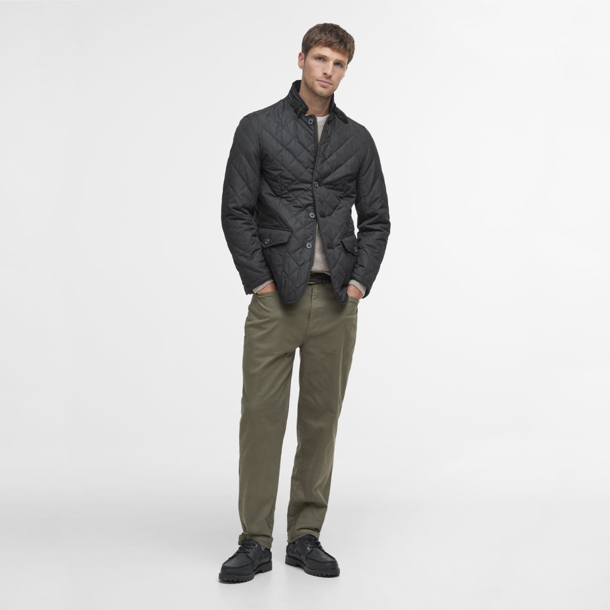 Man wearing Barbour Quilted Lutz Jacket full height photo