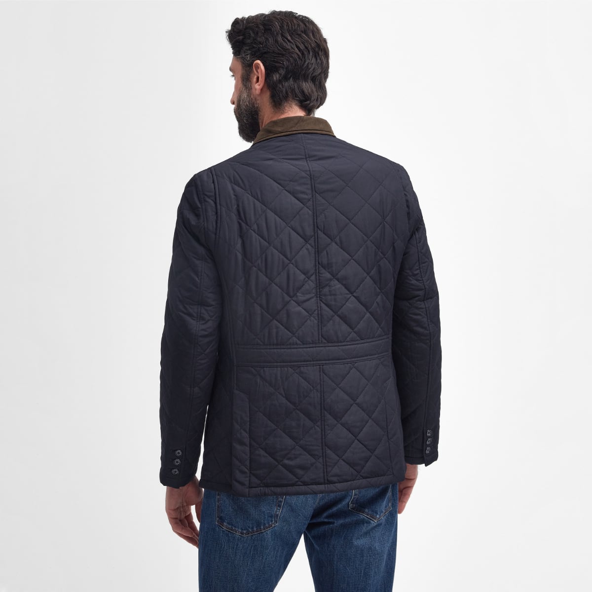Rear view showcasing tailored fit and quilted texture