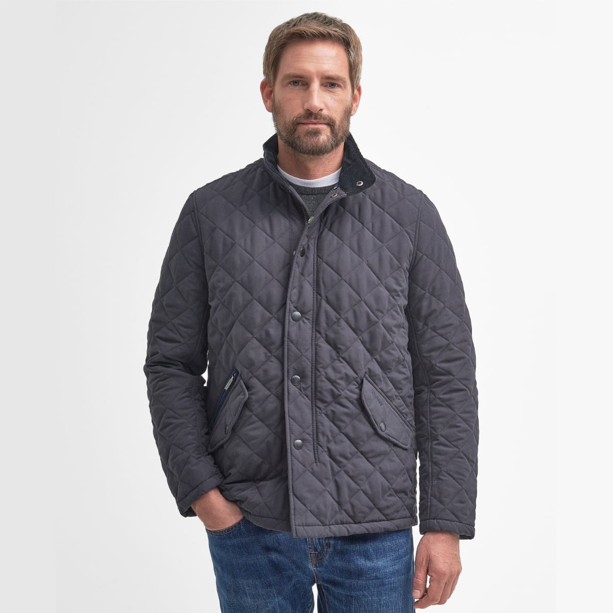 Model wearing Barbour Shoveler Jacket in navy