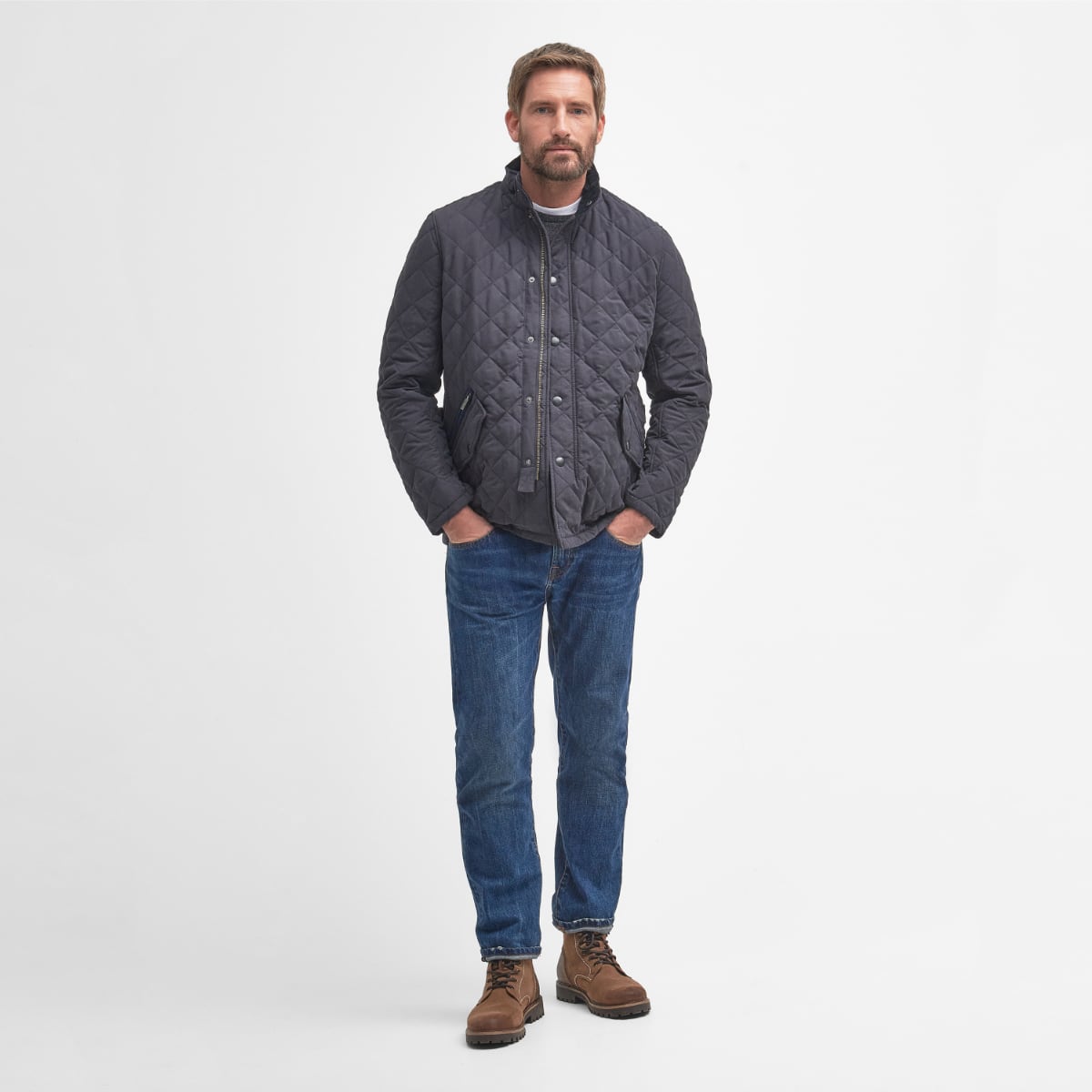Model wearing Barbour Shoveler Jacket in navy - full height
