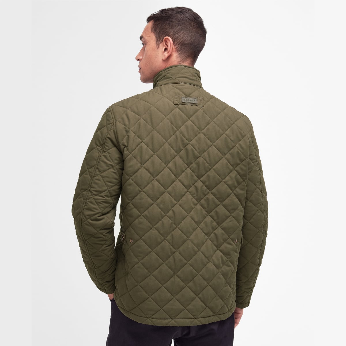 Model wearing Barbour Shoveler Jacket in Army Green - Rear view