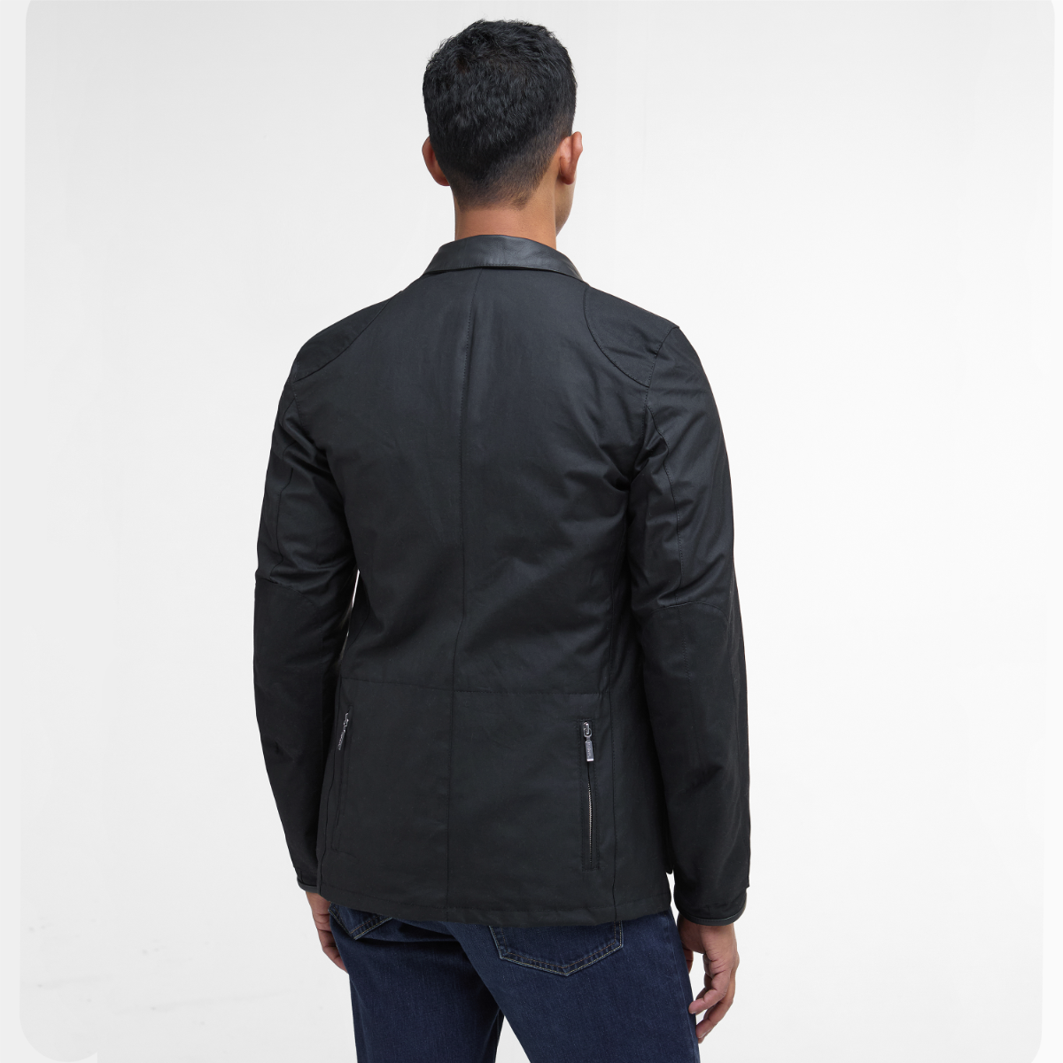 Rear view of Barbour Beacon Sports Wax Jacket on model