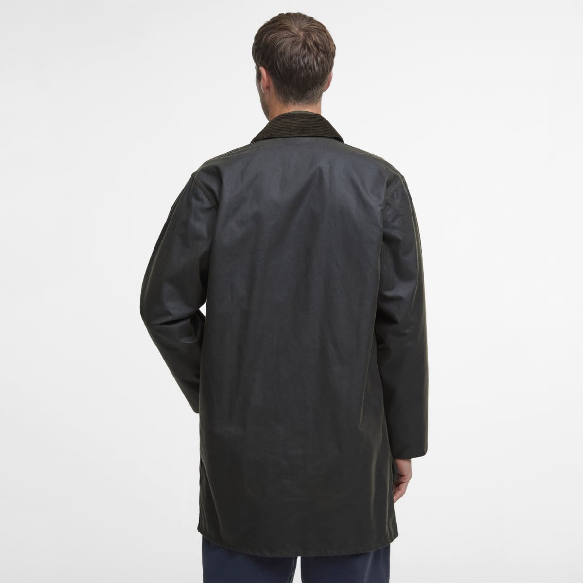 Rear view showing longer cut and shoulder design