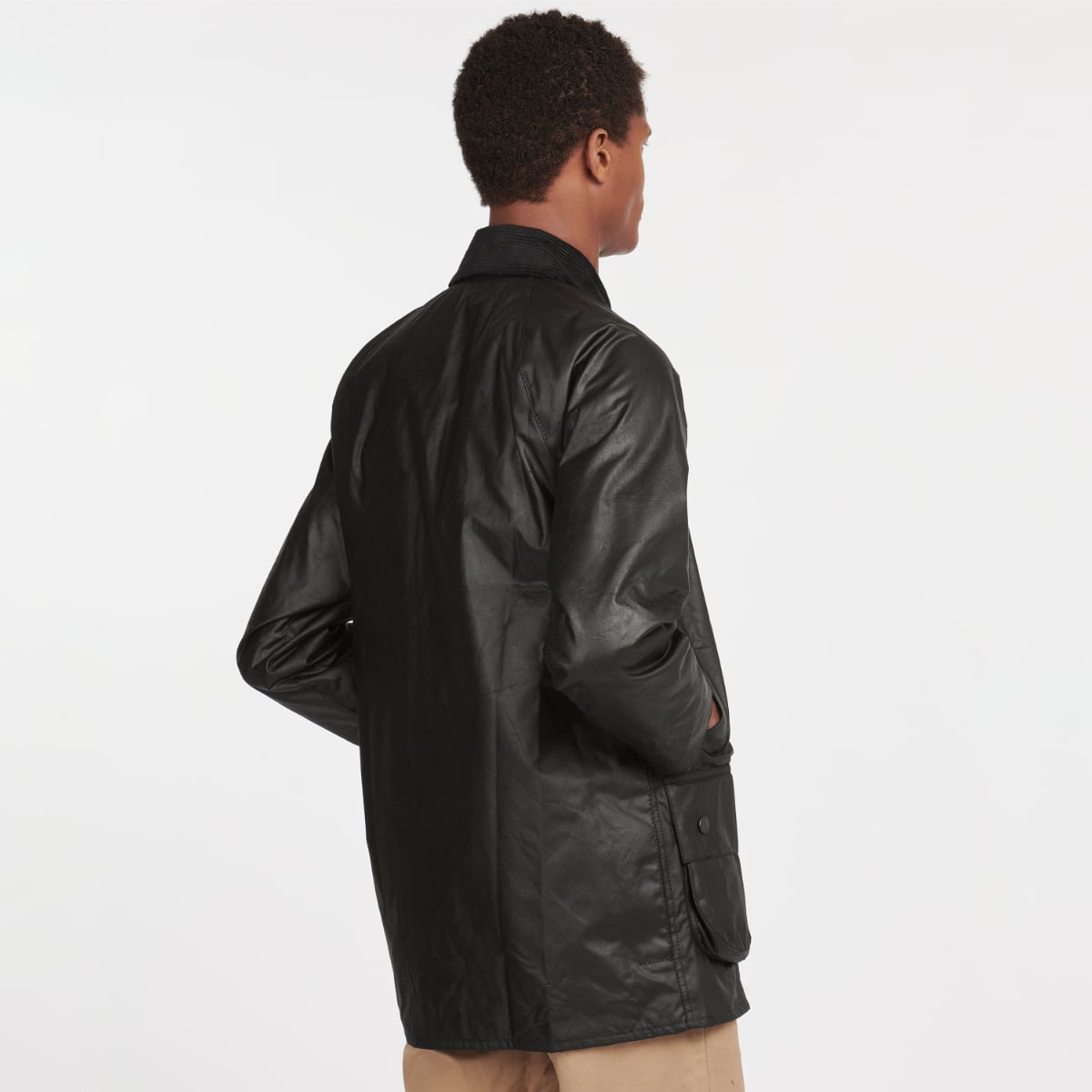 Rear view of Barbour Beaufort jacket with storm flap and rear pocket