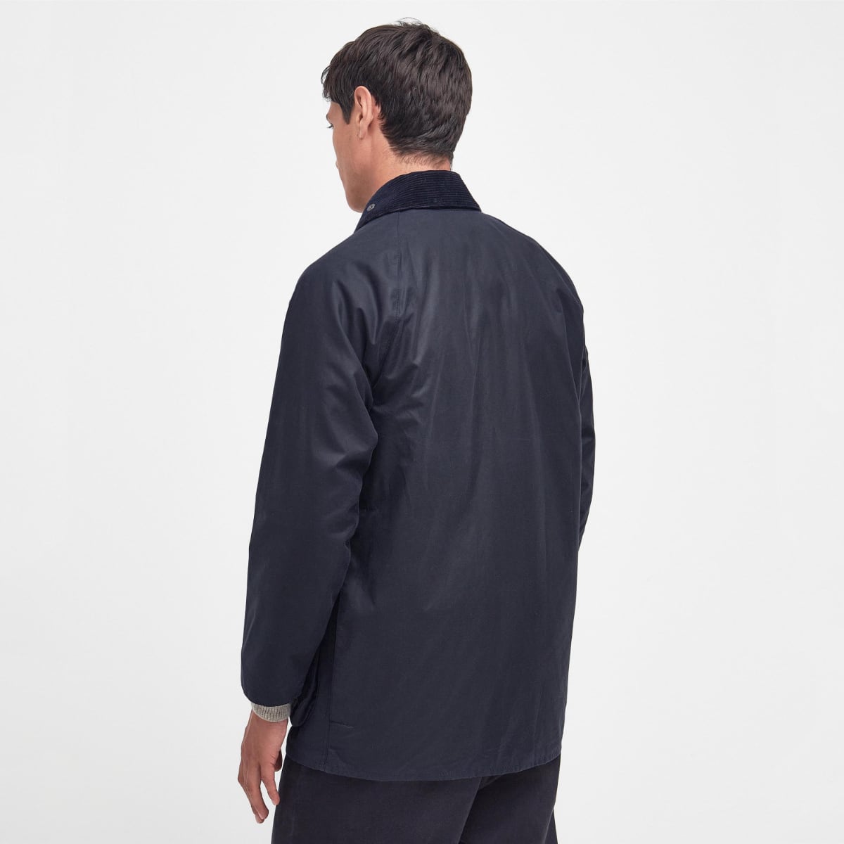 Rear view of Barbour Beaufort jacket with storm flap and rear pocket
