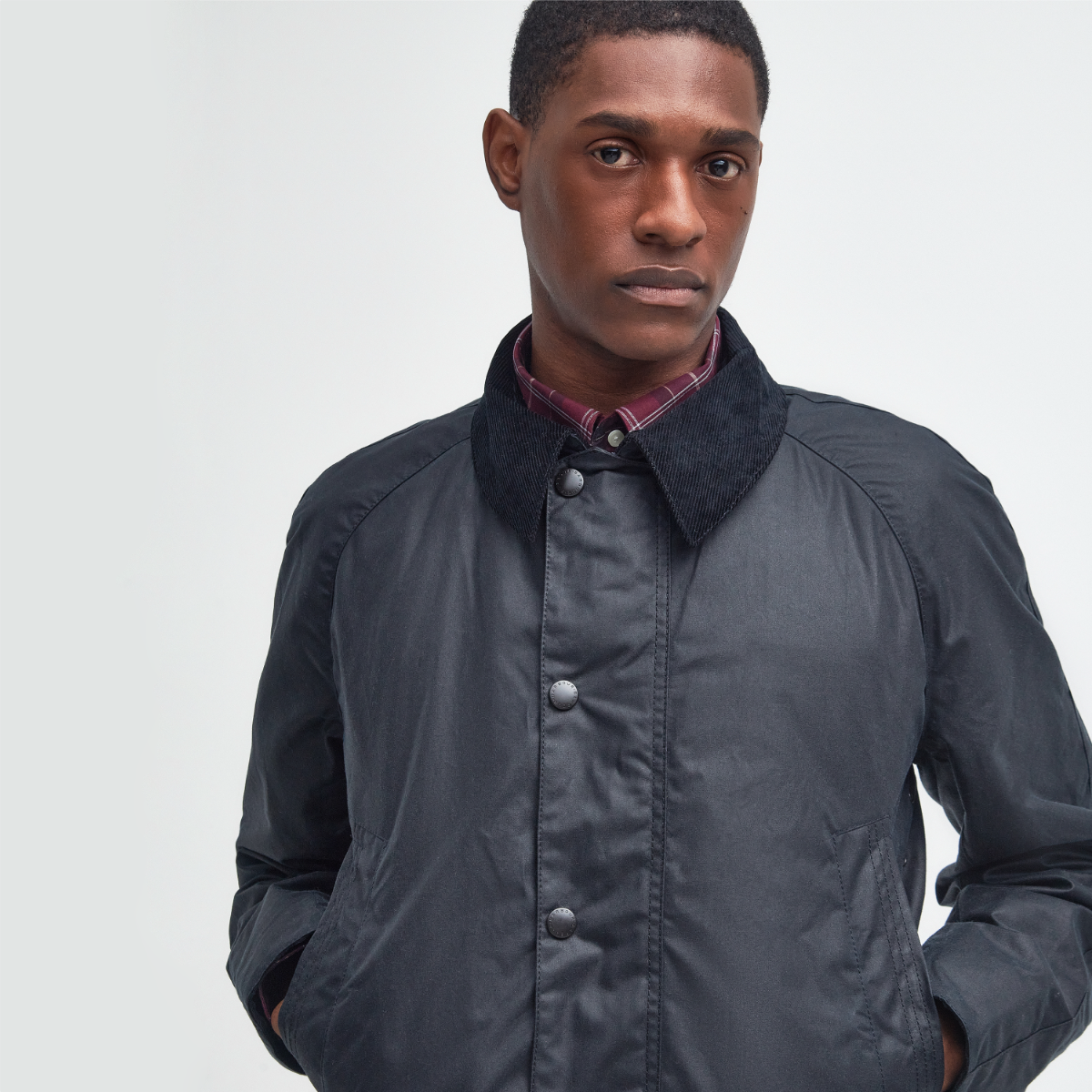 Close-up of Barbour corduroy collar and storm flap