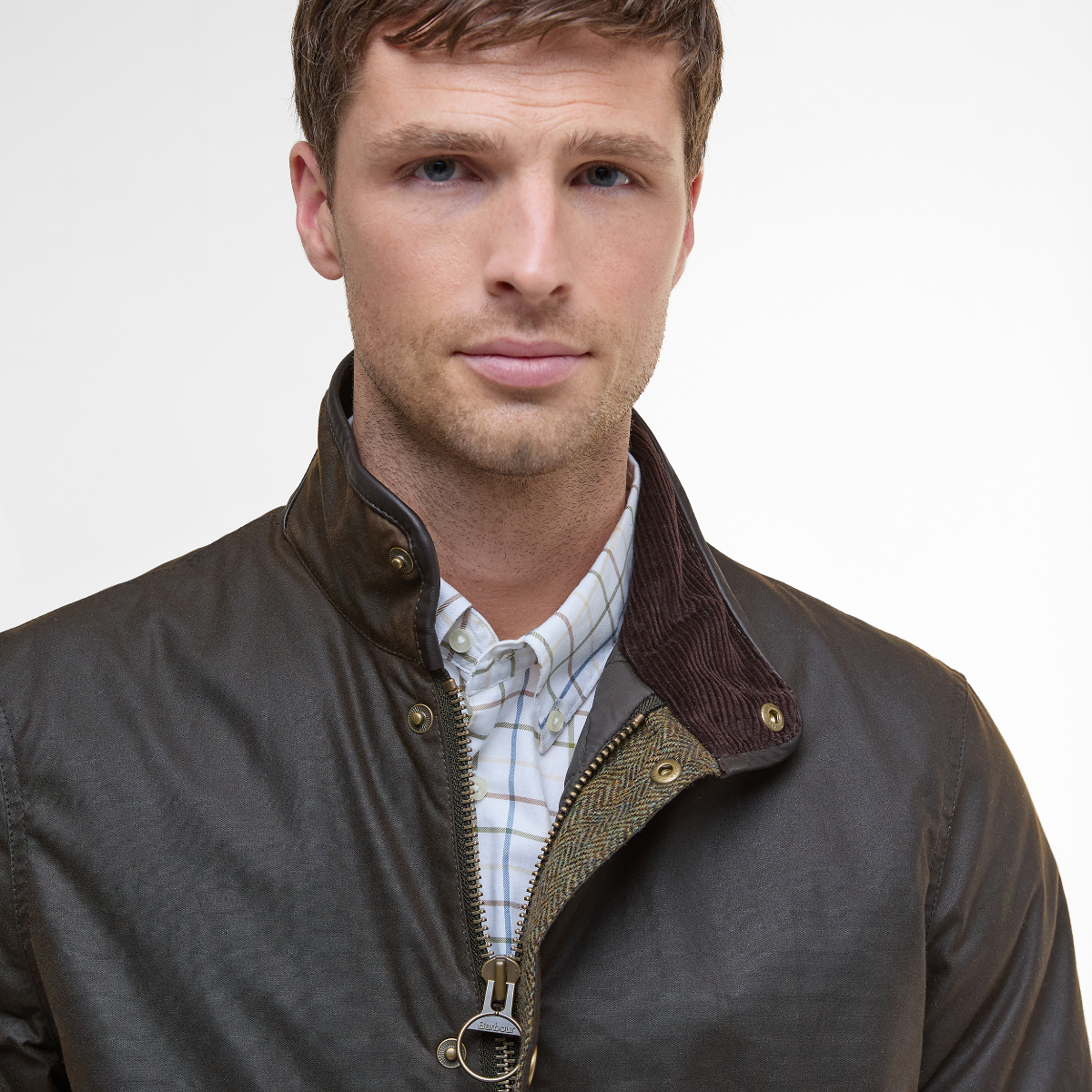 Close-up of Barbour tartan lining and corduroy collar