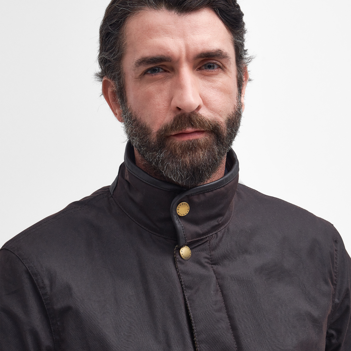 Close-up of Barbour tartan lining and corduroy collar