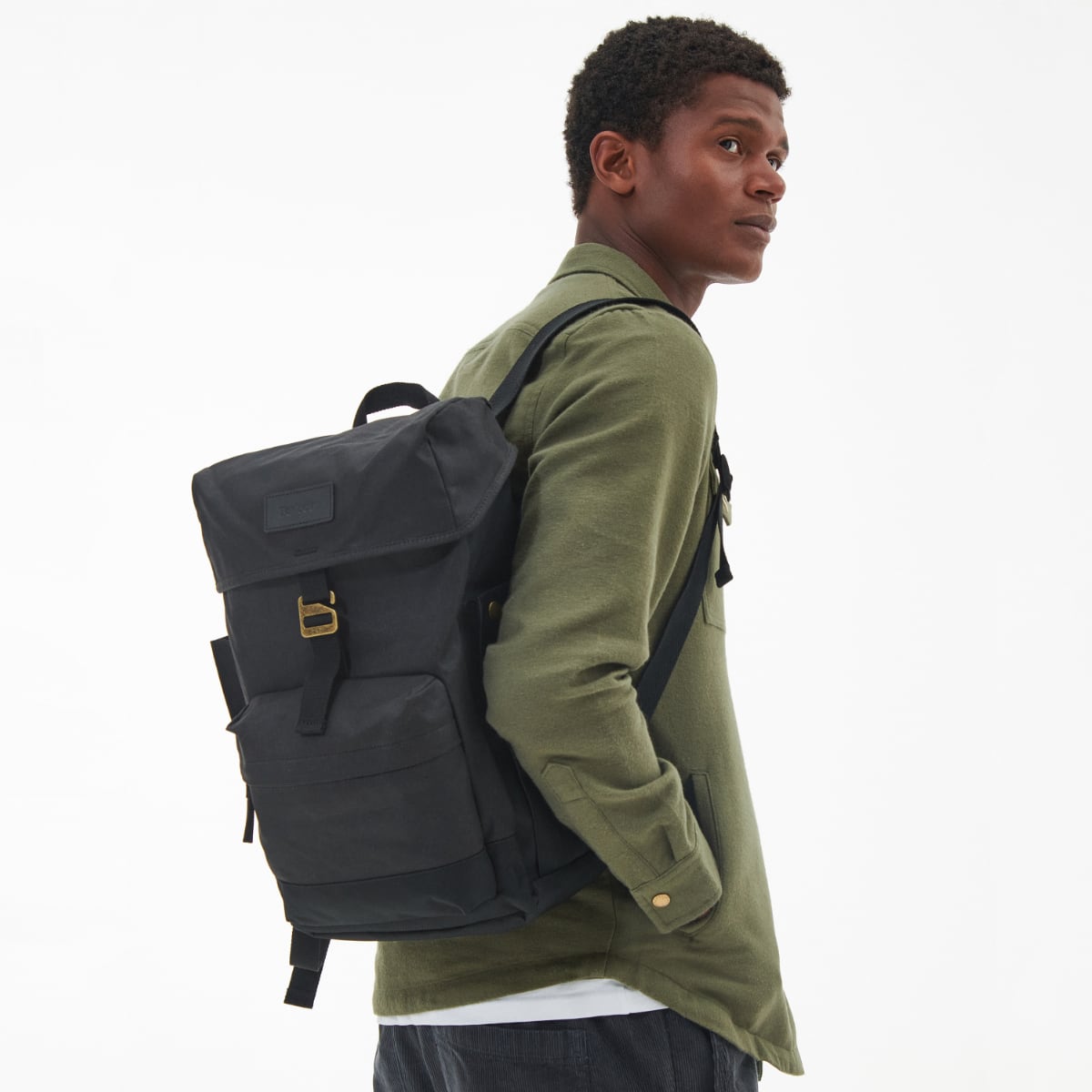 barbour-essential-wax-backpack-black-worn-by-model