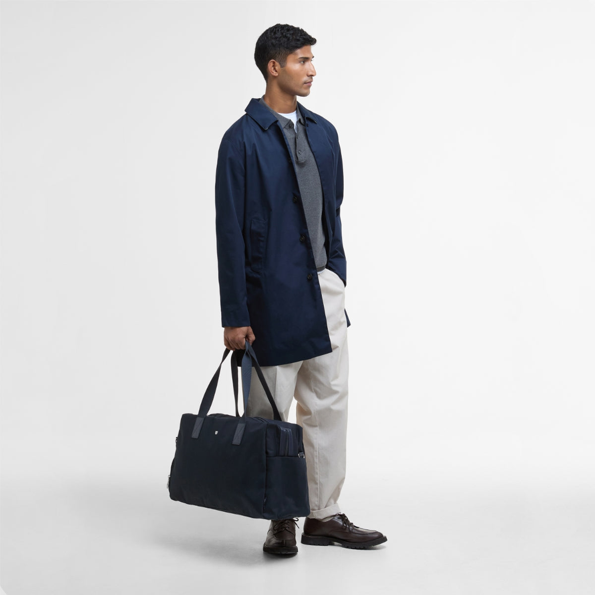 Barbour Cascade City Holdall held by model