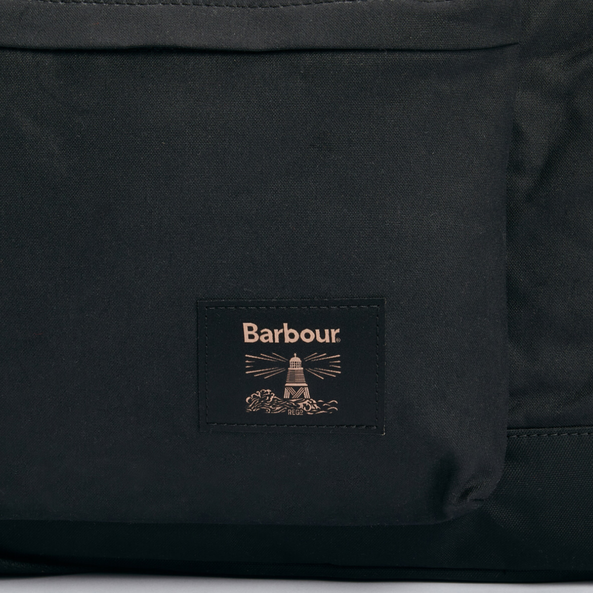 Barbour Field Wax Holdall in black – close up of logo