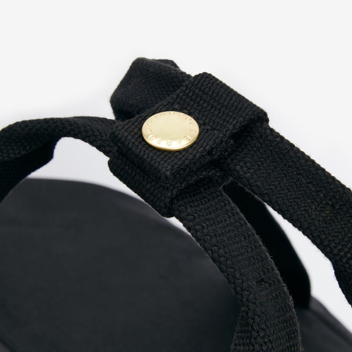 Barbour Field Wax Holdall in black – close up of webbing handle