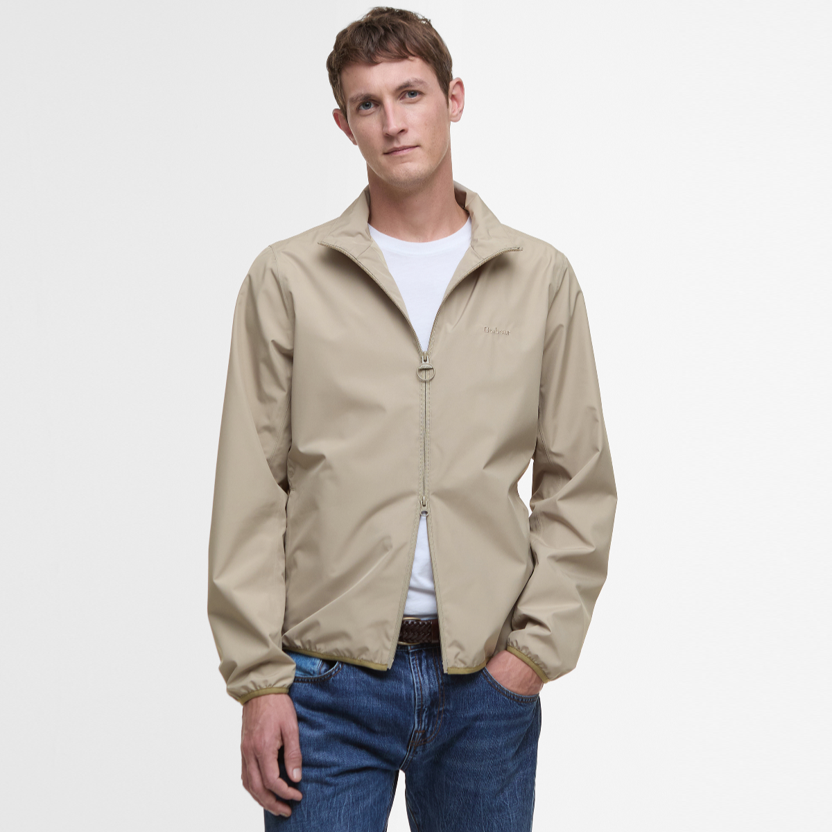Barbour Korbel Waterproof Jacket Washed Stone worn by a model with zip front and stand collar