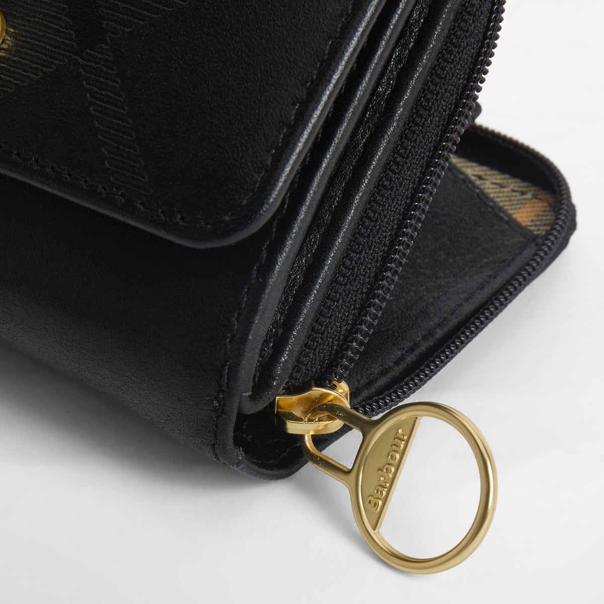 Barbour Rosa French Purse in black deboss leather with a gold zipper pull.