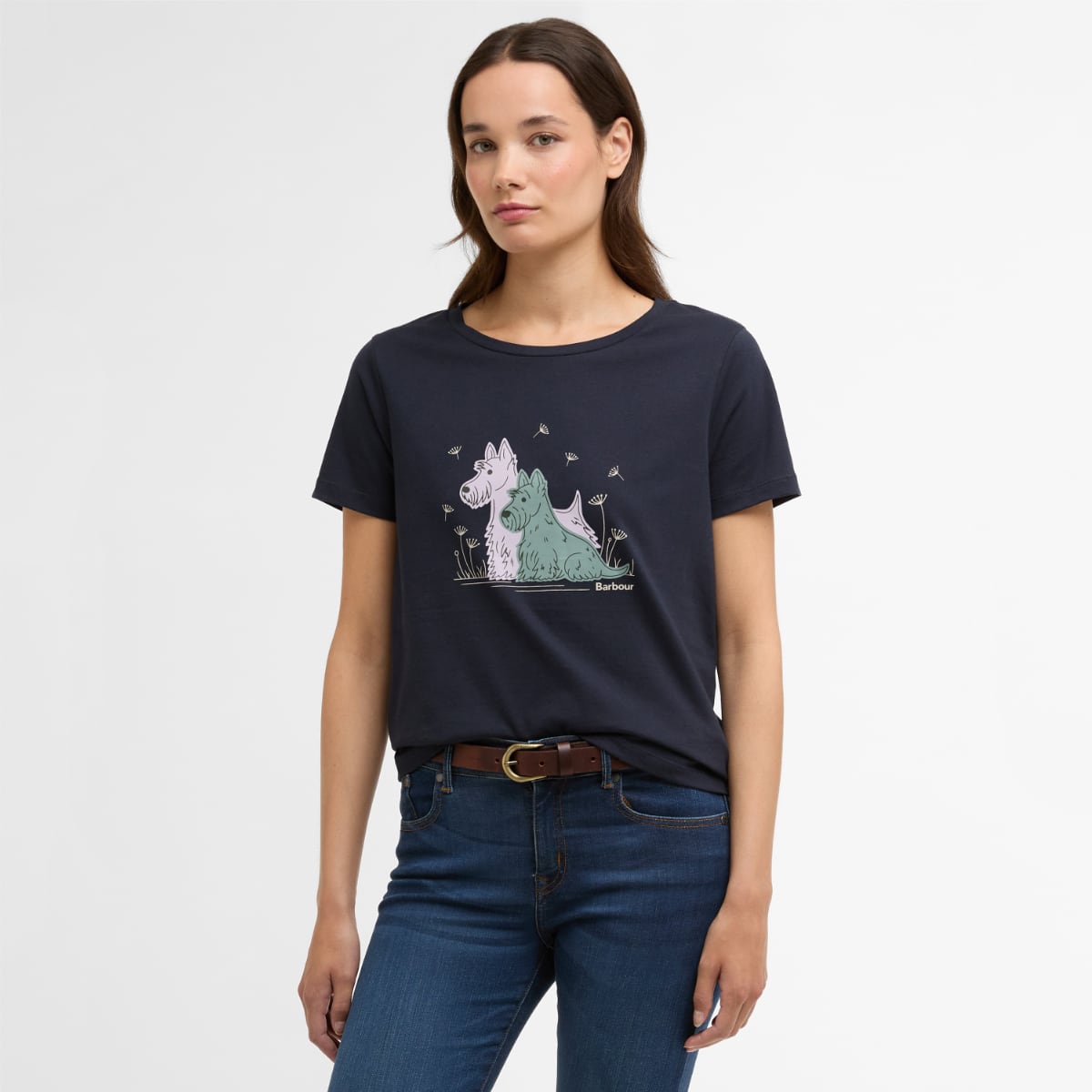 Model wearing navy Barbour Clover T-Shirt with pastel dog illustration on the front.