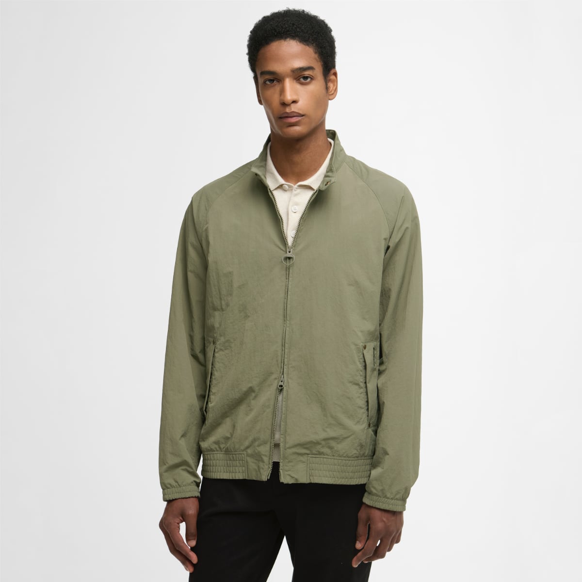 Barbour Royston Showerproof men's jacket in dusty olive, front view on a model.