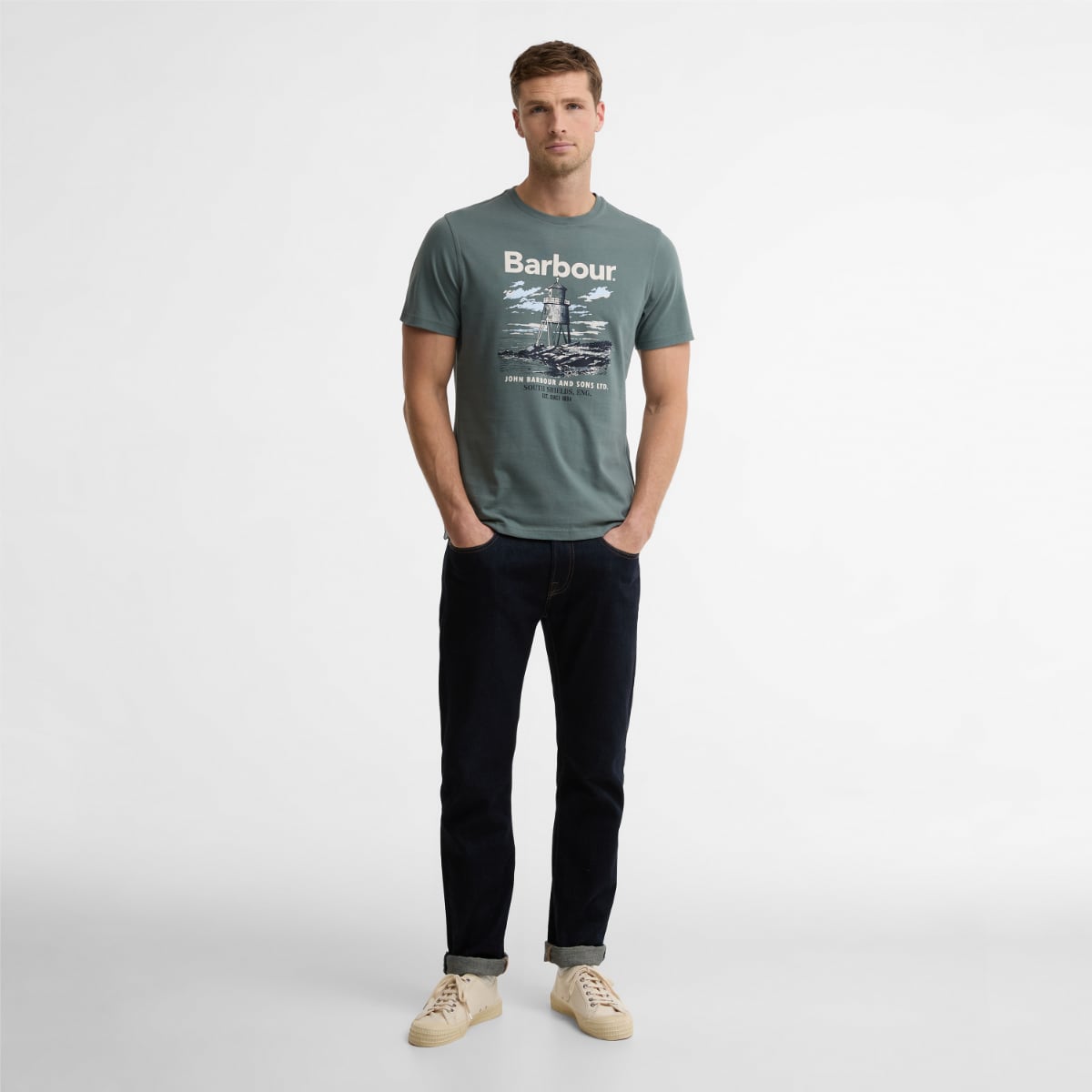 Model wearing Barbour Harbourside Graphic Tailored Men's T-Shirt in Vintage Teal front view with lighthouse graphic