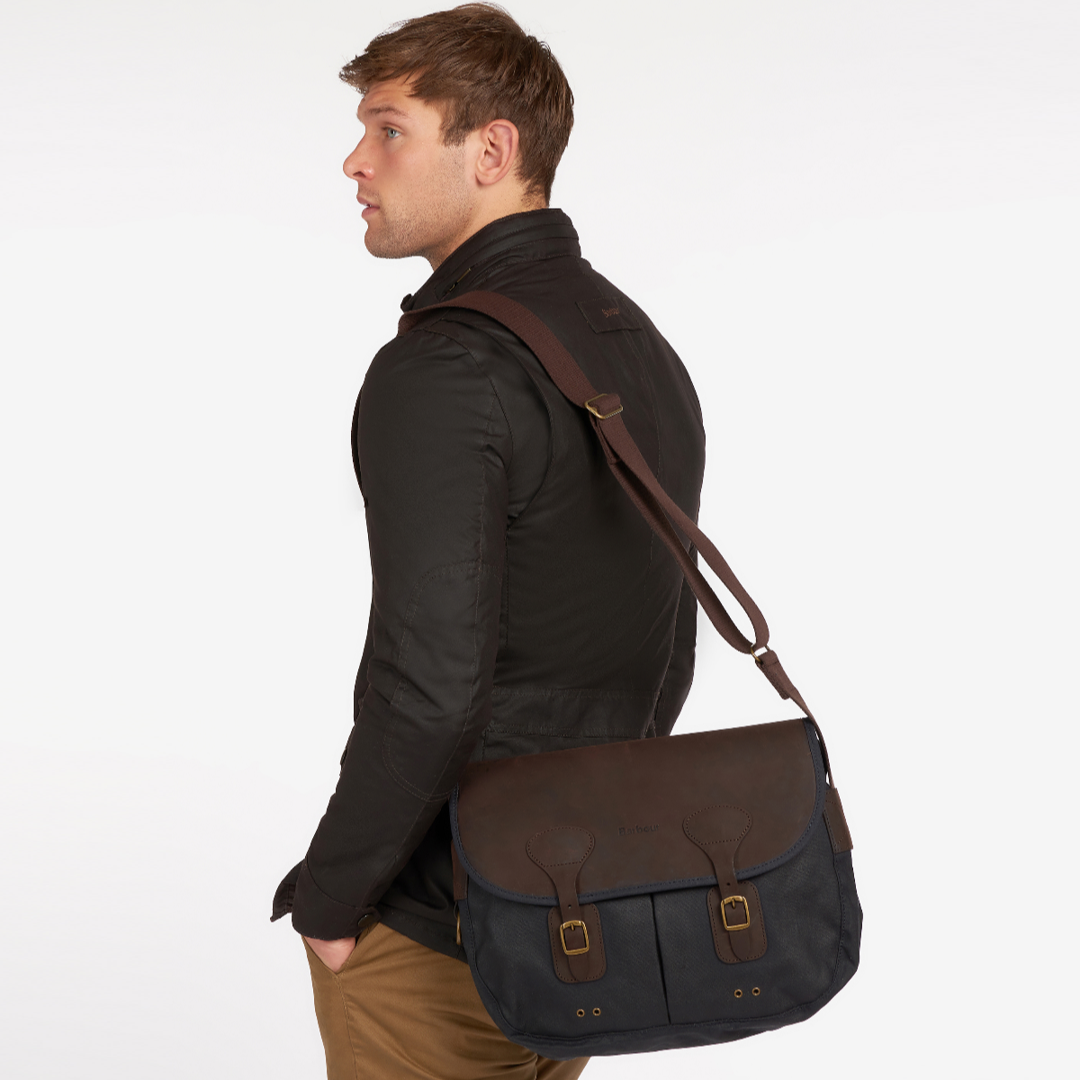 Barbour Tarras Bag worn crossbody outdoors – Countryside Lifestyle Image
