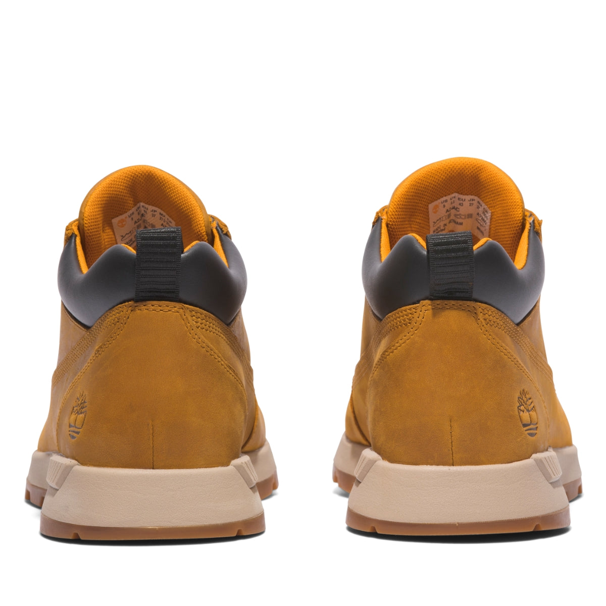 Rear view A pair of Timberland Killington Trekker Low Chukka Men's Boots in wheat color, featuring a lace-up closure, with the Timberland logo visible on the heel outer side.
