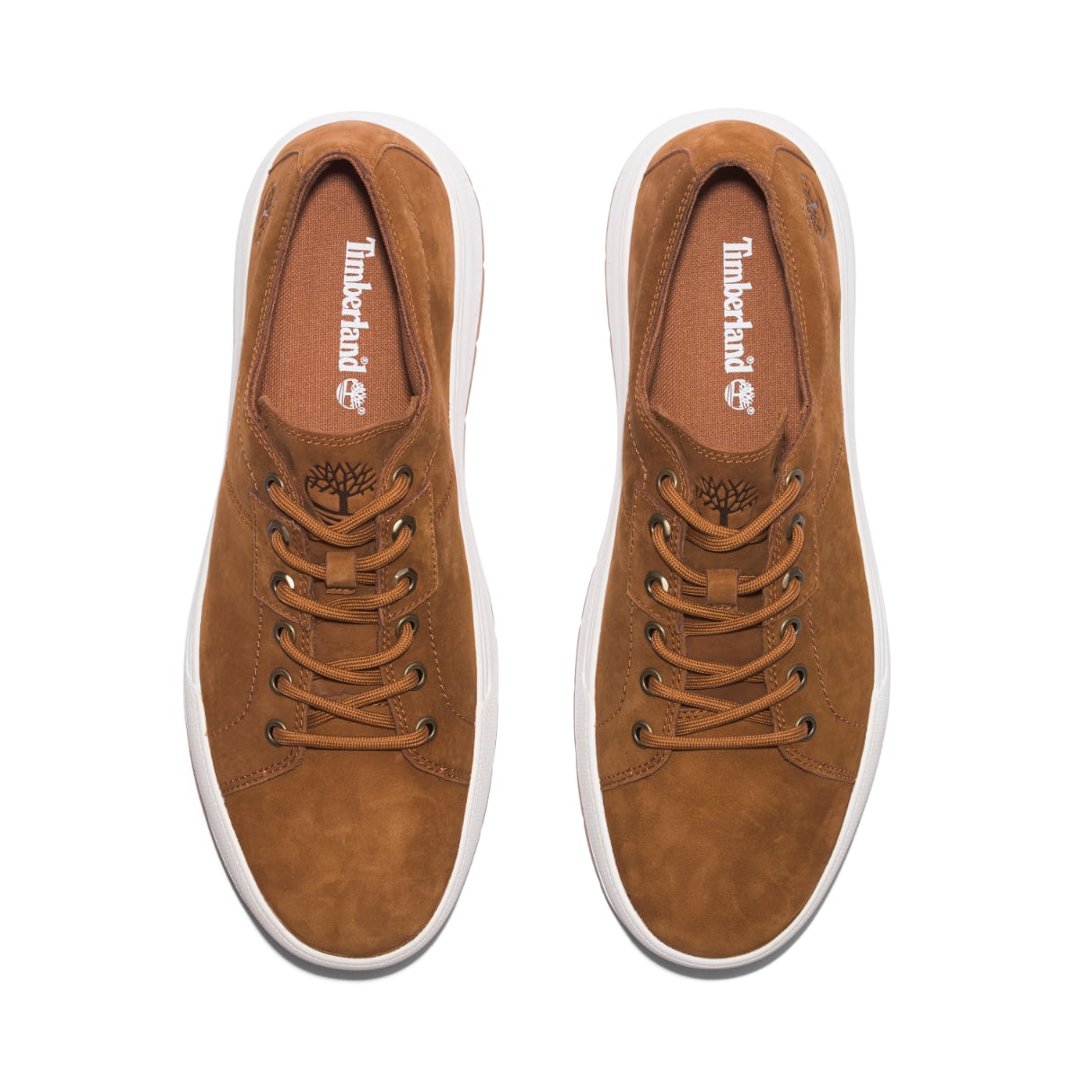 A pair of brown Timberland Maple Grove Low Men's Shoes with a lace-up closure and a rubber outsole. Top-down view.