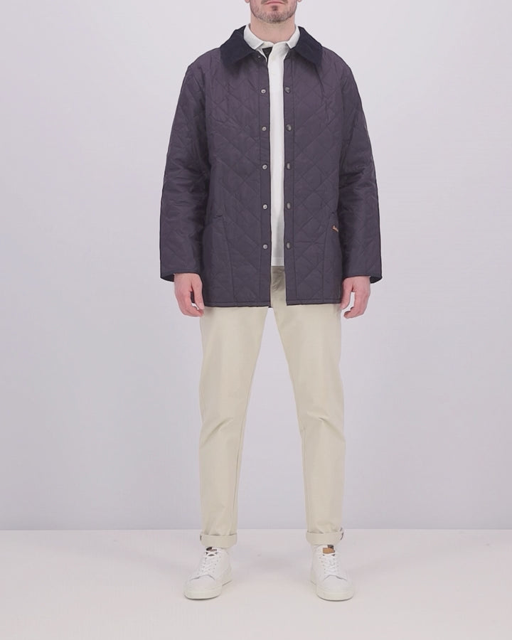 Video of model wearing a Barbour Liddesdale Quilted Jacket in Navy