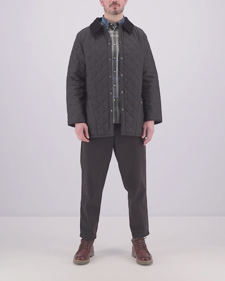 Video of model wearing a Barbour Liddesdale Quilted Jacket in Black