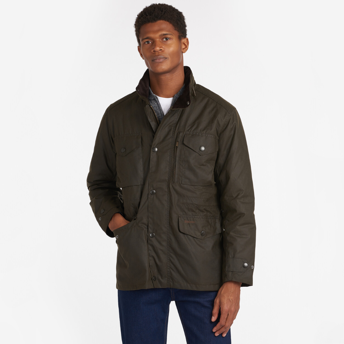 Barbour Sapper Wax Jacket in Olive worn by model.
