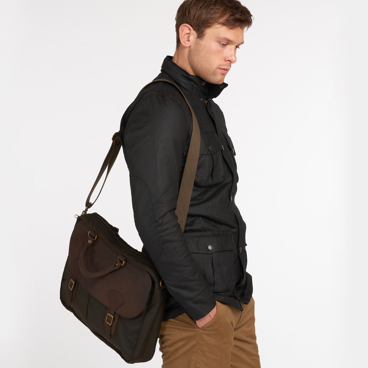 Barbour Olive Wax Leather Briefcase with adjustable shoulder strap and brass hardware – angled front view