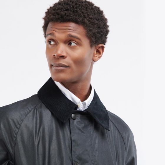 Close-up of Barbour Beausby waxed cotton fabric and collar detail