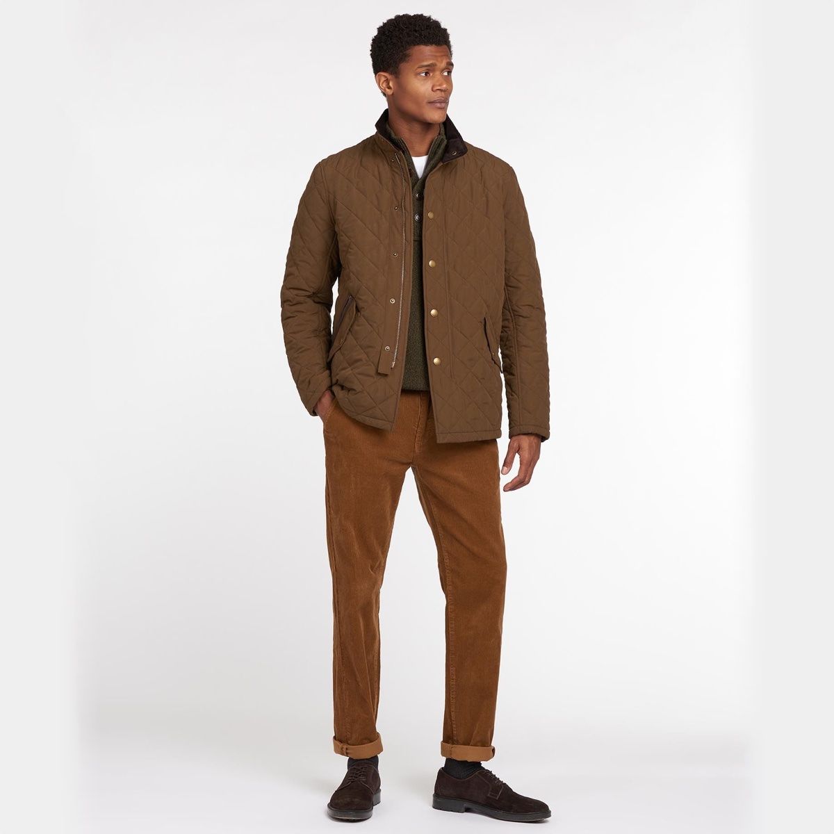 Model wearing Barbour Shoveler Jacket in Dark Sand full height