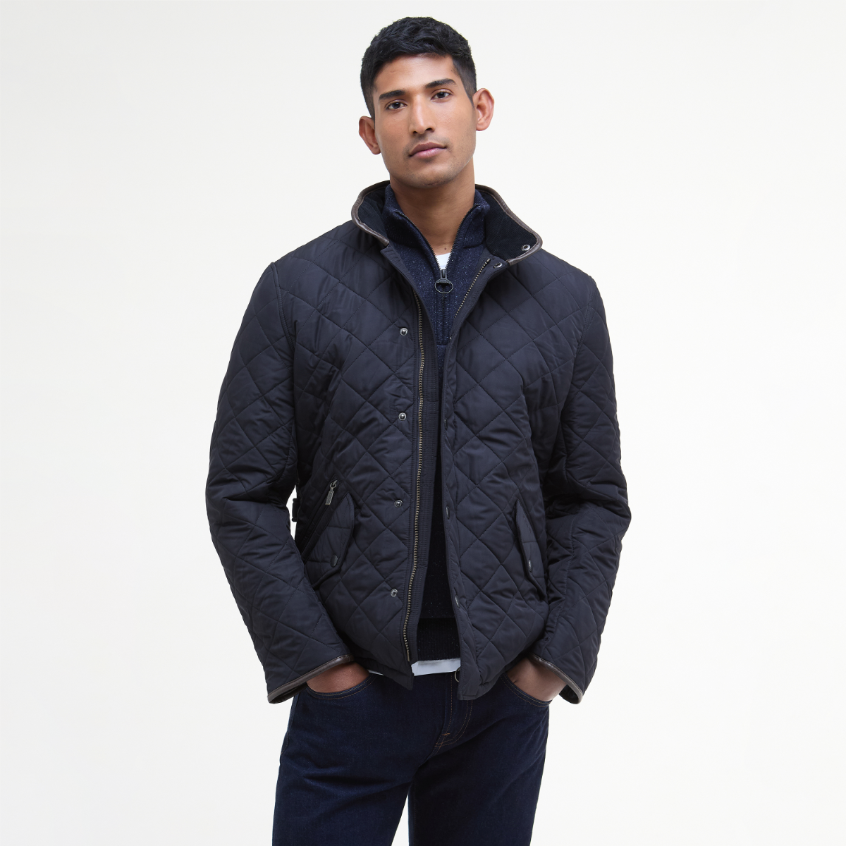 Front view of Barbour Powell Quilted Jacket in navy on model