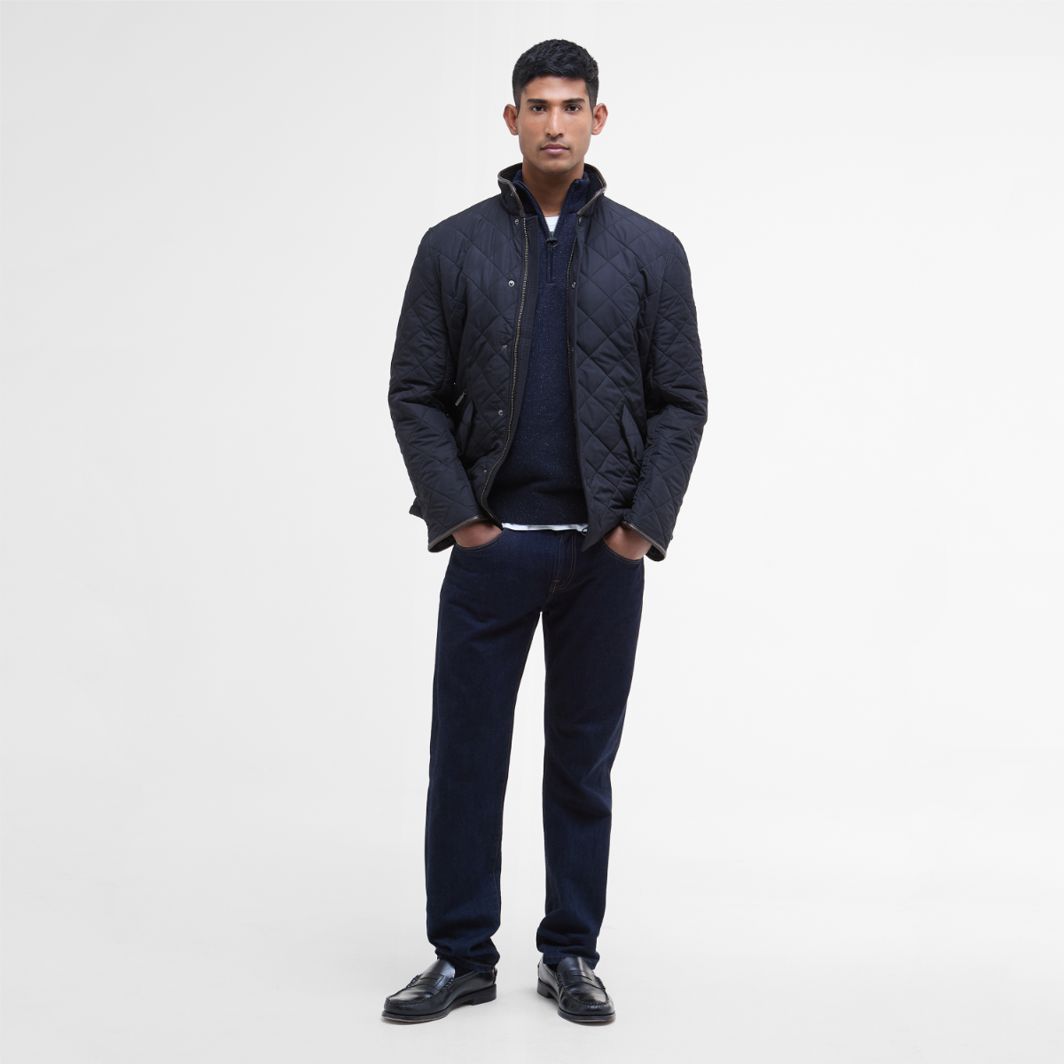 Front view of Barbour Powell Quilted Jacket in navy on model full height